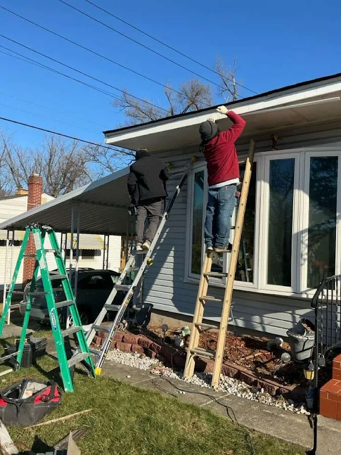 Restoration crew performing exterior repair in West Valley City